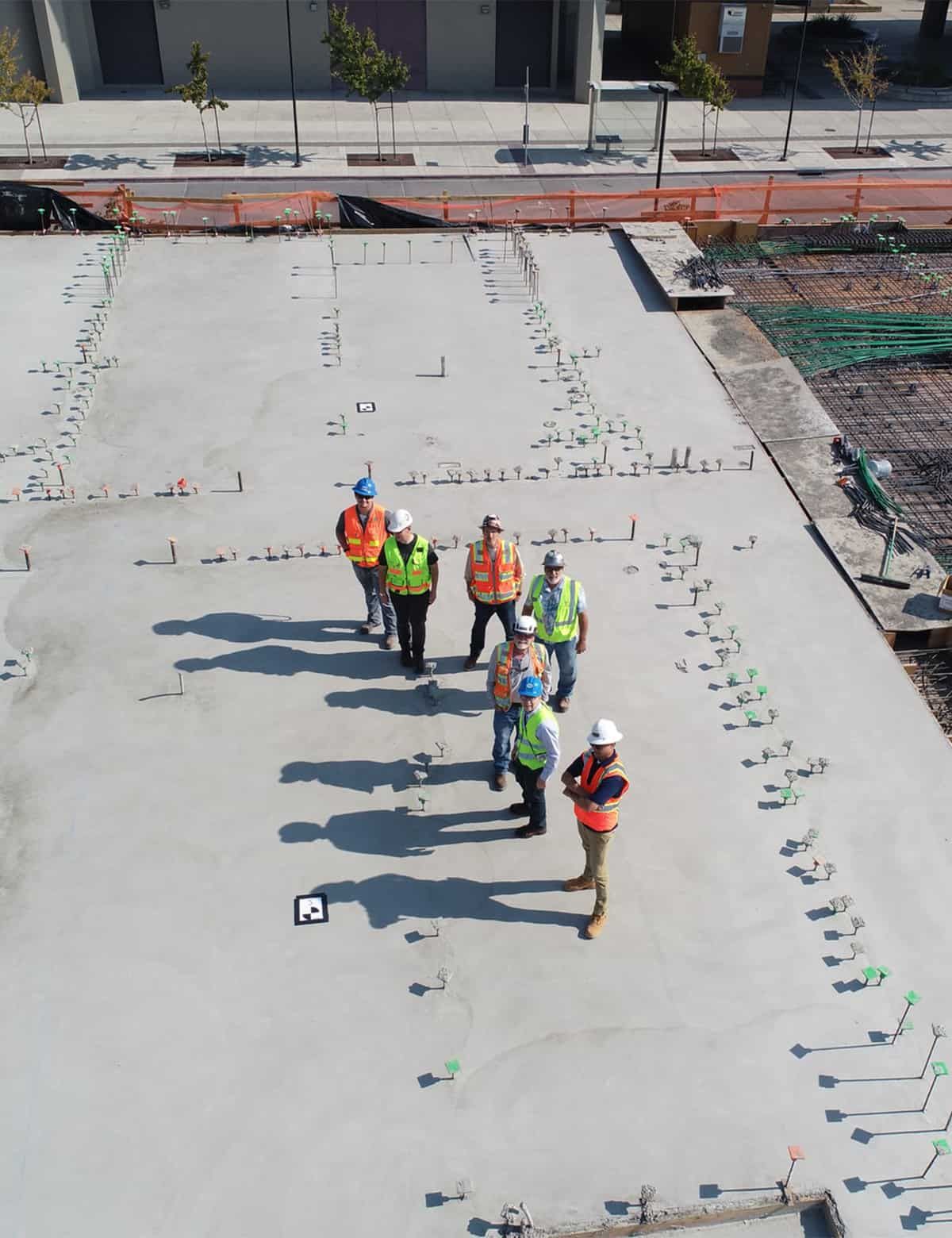 group of construction workers looking up