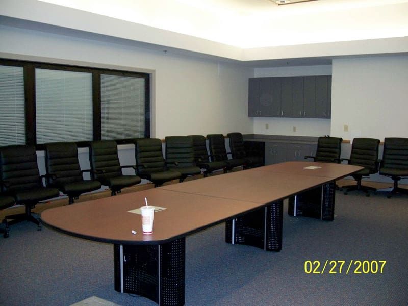 large board room table with 12 chairs