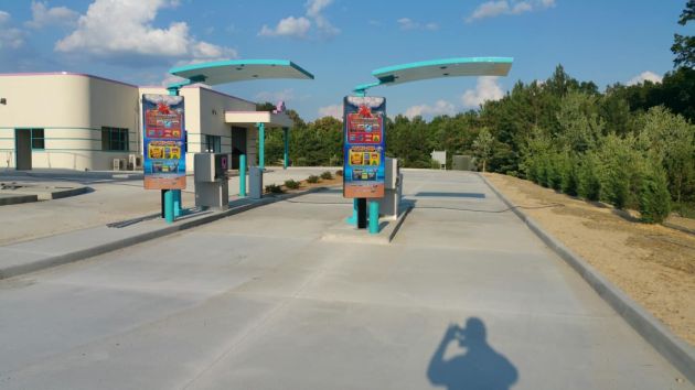 drive-up order lanes of tunnel car wash
