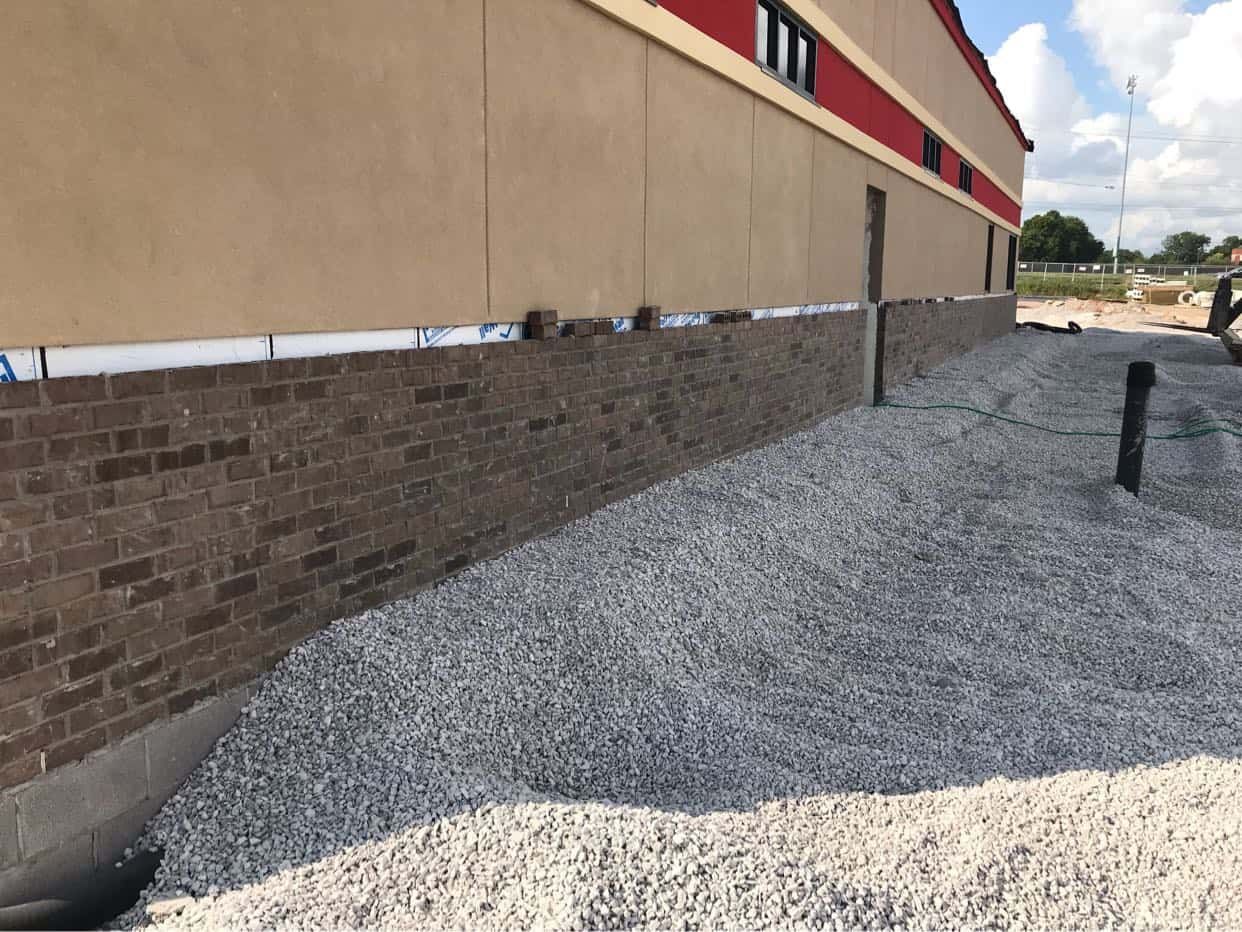 exterior wall and gravel