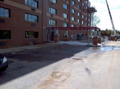 brown apartment building entry under construction