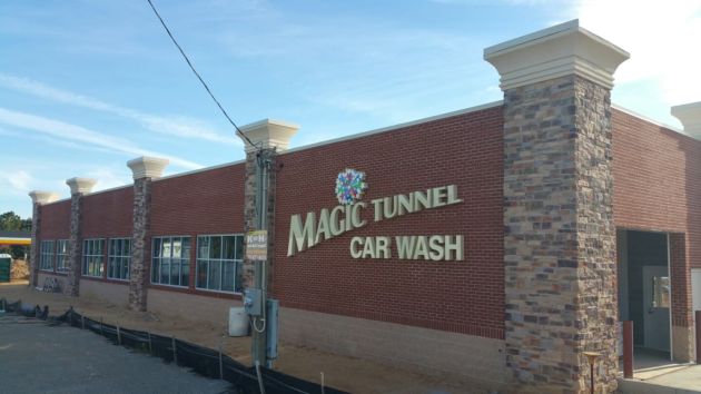magic tunnel car wash signage on car wash building