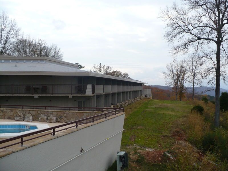 outdoor pool and hotel on a hill