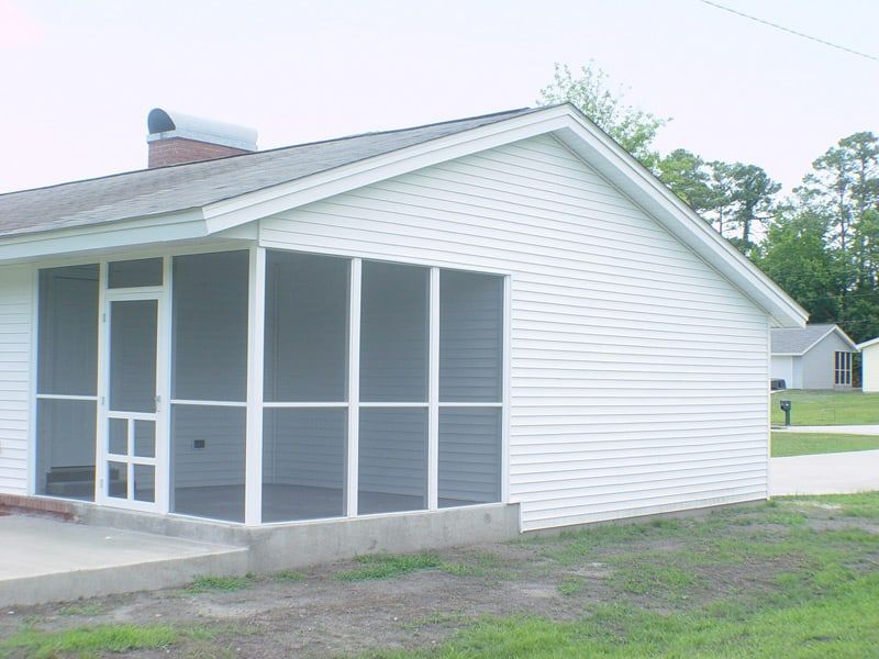 small patio of a white house