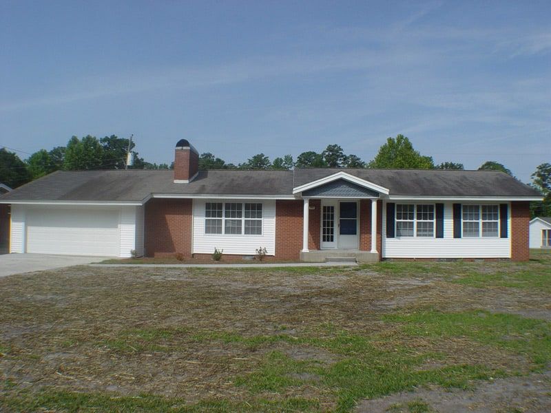 red and white brick home