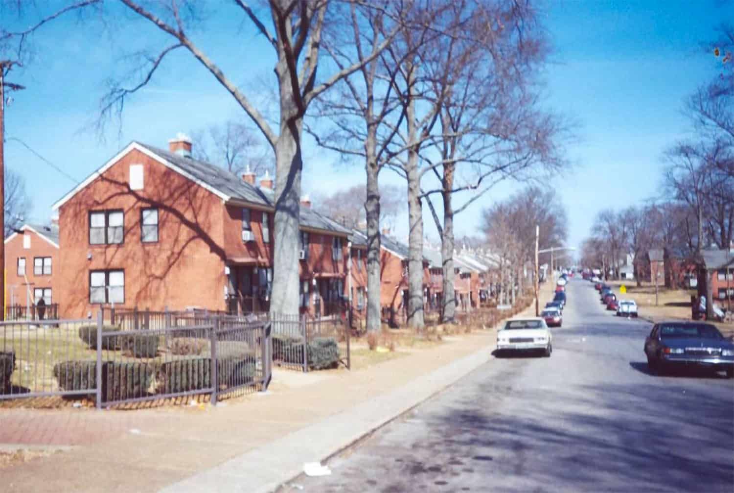 JC Napier homes on a car lined street
